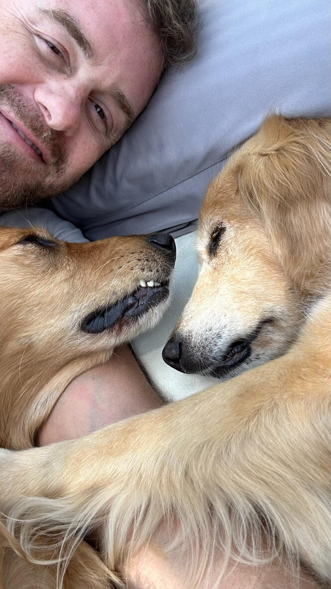 Ryan resting with his dog